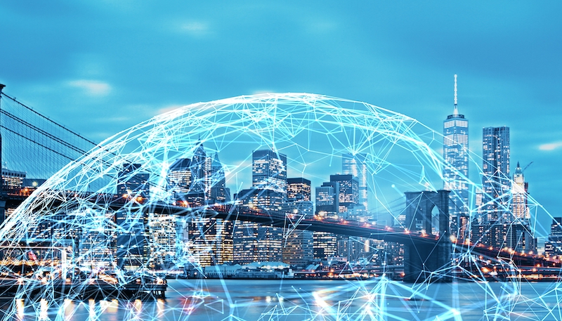 New York City skyline with digital data overlay representing AI-assisted condo valuations and property tax assessments.