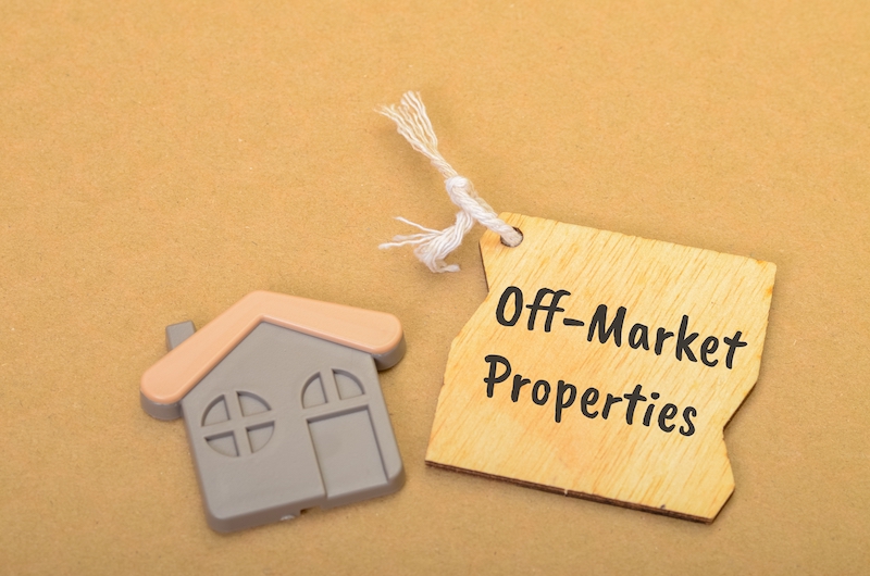 Private listings in real estate represented by an off market properties sign and house