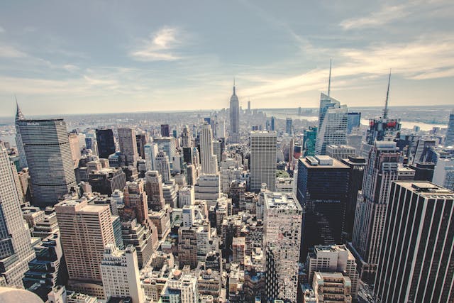 Downtown Manhattan skyline viewed from the river, facing the World Trade Center, illustrating how listing visibility and market context shape New York City real estate.
