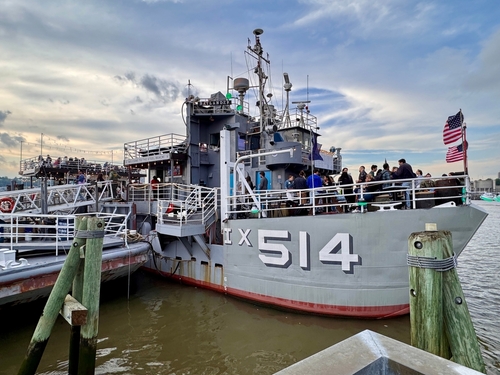 The Baylander Steel Beach floating restaurant and bar docked at West Harlem Piers along the Hudson River in Manhattan